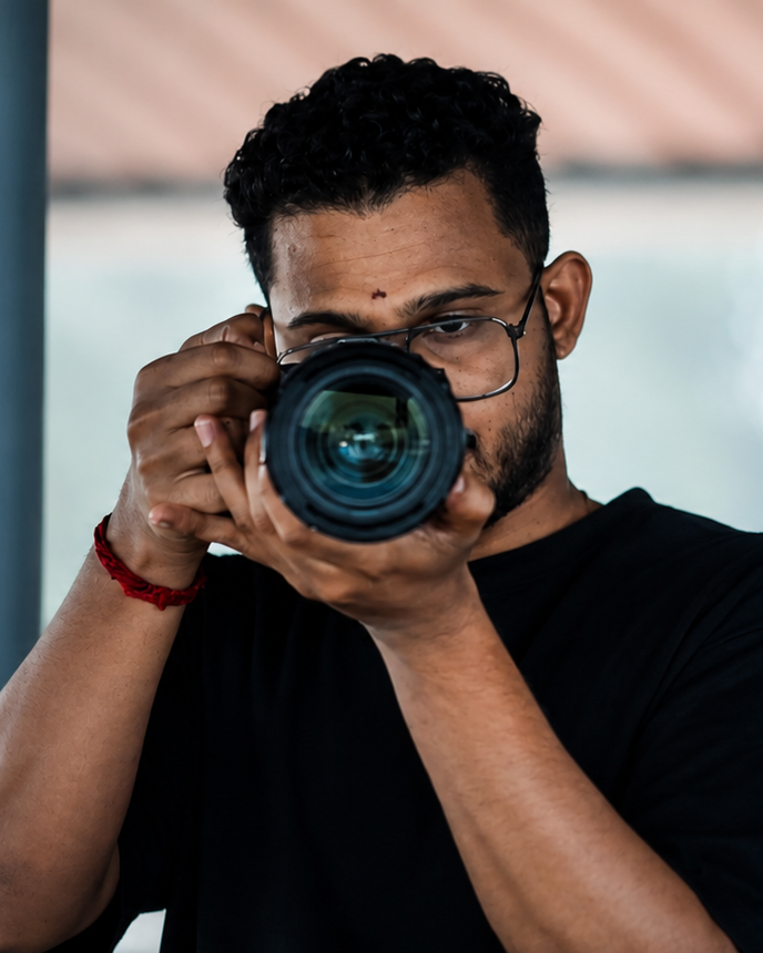 Atal Shetty with a camera
